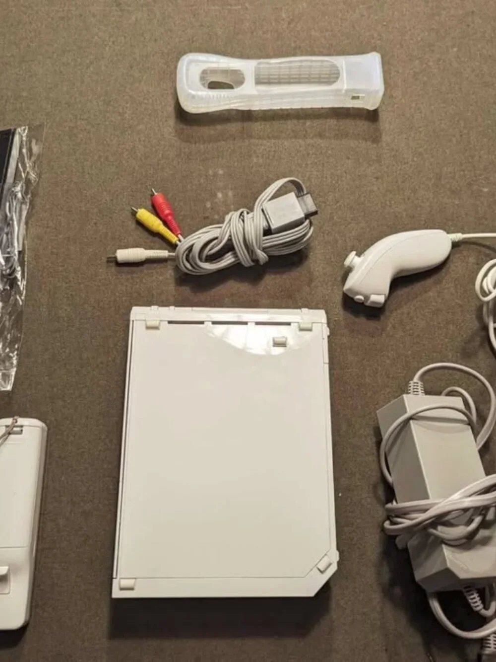 Nintendo Authentic Wii Console White Controllers + chuck Cords and accessories.